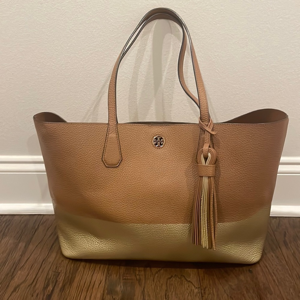 Tan and Gold Tory Burch Tote Bag nice and roomy. Comes with dust bag. Beautiful
